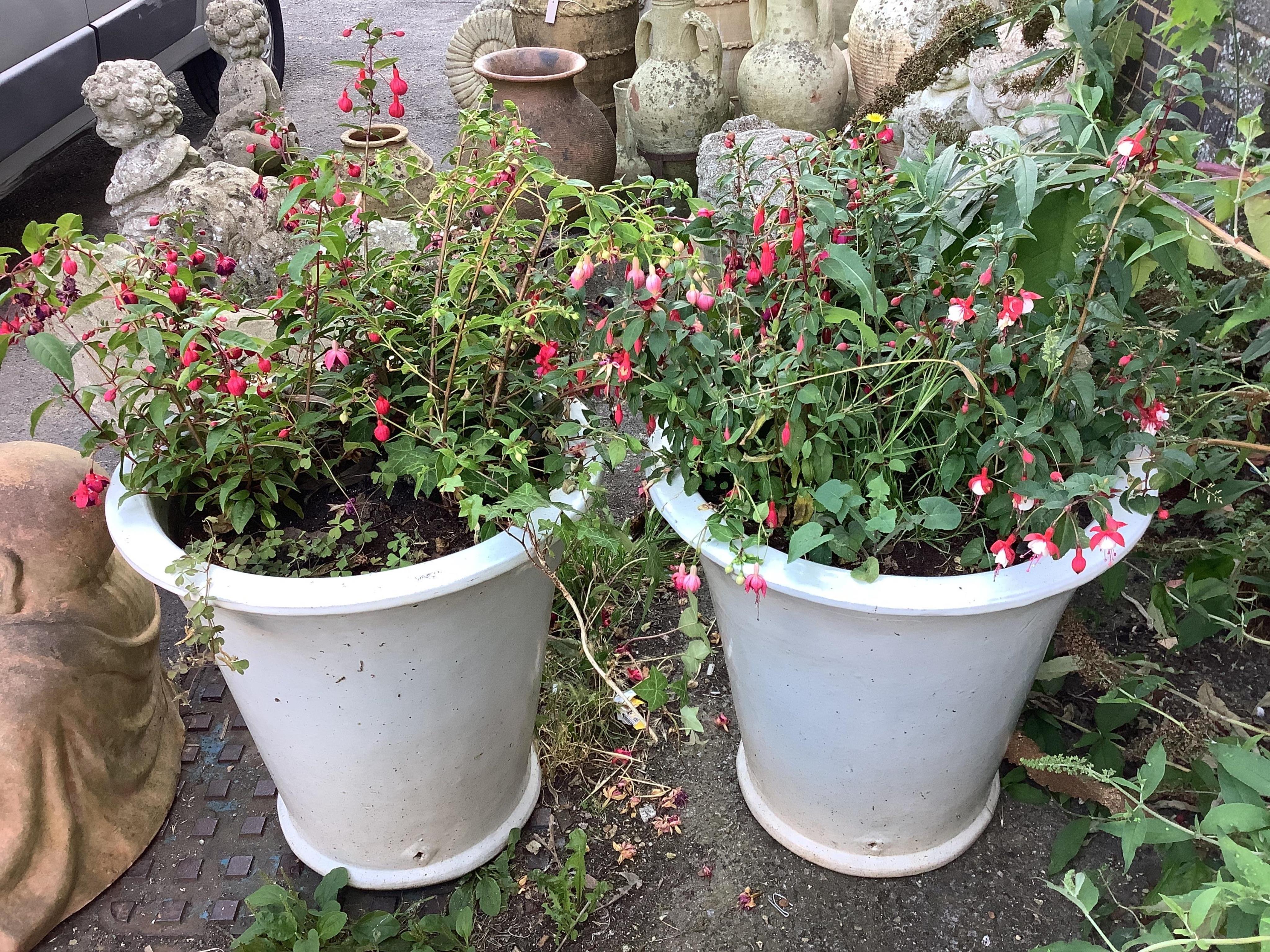 A pair of circular glazed earthenware garden planters, diameter 54cm, height 52cm. Condition - good